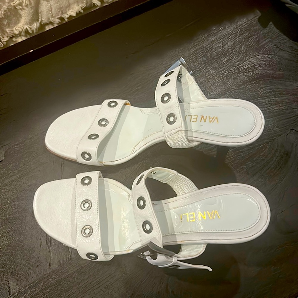 White Vaneli shoes with 2 inch heel. Buckle closure. Minimally worn. Size 6.5